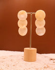 Boucles d’oreilles Pièce écru